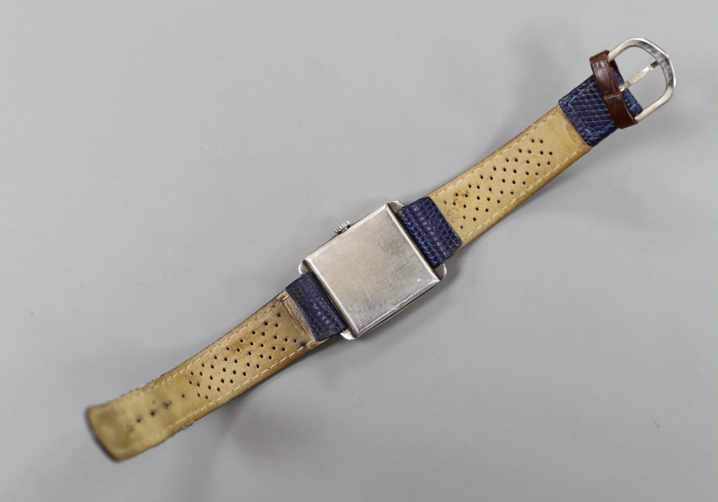 A gentleman's 1970's silver Rotary manual wind wrist watch, with Arabic dial, on associated leather strap, case diameter 30mm, no box or papers.